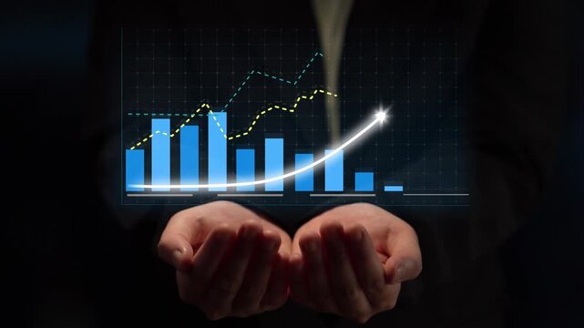 Visual representation of hands holding a transparent growth chart, highlighting financial progress and business success with blue bars and a rising line graph. Copula