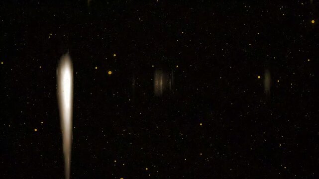 Abstract cosmic background featuring a dense golden starfield with glowing vertical light streaks on a dark space backdrop. Ideal for science fiction, astronomy
