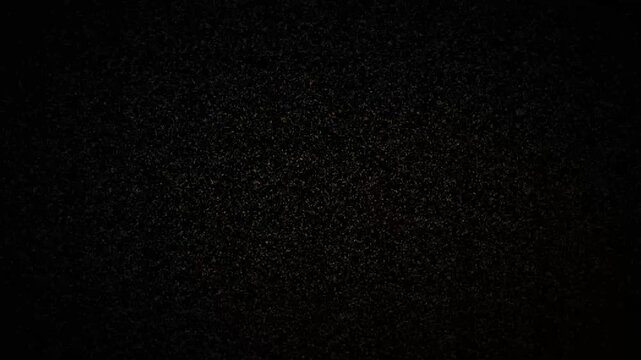 Dark Textured Background with Subtle Speckles and Vignette Effect noise