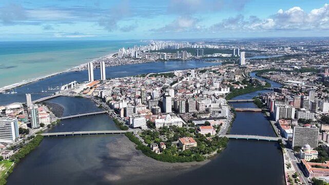 Riverfront Scene In Recife Pernambuco Brazil. Amazing Skysrapers And Traffic On Street Viewed From Above. Town Sky Clouds Backgrounds Urban. Town Outdoor Panorama. Recife Pernambuco.