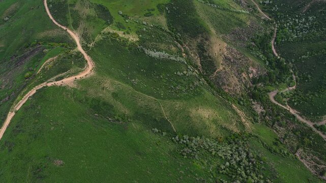 Mountainous area with different vegetation. Daylight saving time.