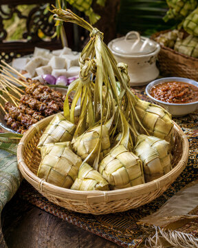 Traditional Ketupat and Satay Feast for Eid Celebration