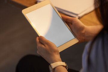Person holding a tablet with blank screen © Pixel-Shot