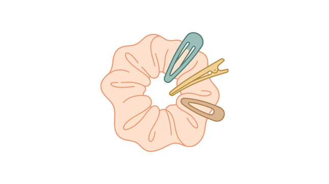 A soft peach scrunchie adorned with three colorful hair clips.