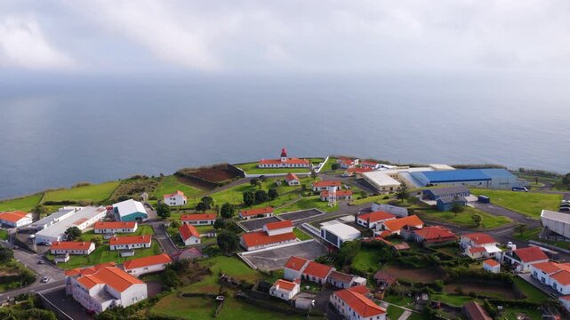 Lajes das Flores Village And The Lighthouse In Azores, Portugal. - aerial shot