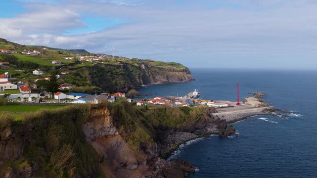 Coastal Village Of Lajes das Flores And Commercial Port of Flores Island in Azores, Portugal. - aerial shot