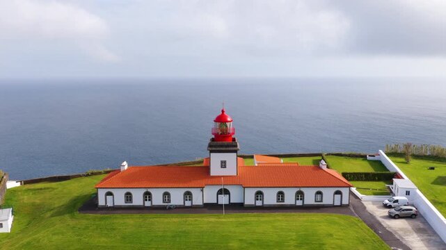 Ponta das Lajes Lighthouse With Atlantic Ocean In The Background In Flores Island, Azores, Portugal. - aerial shot
