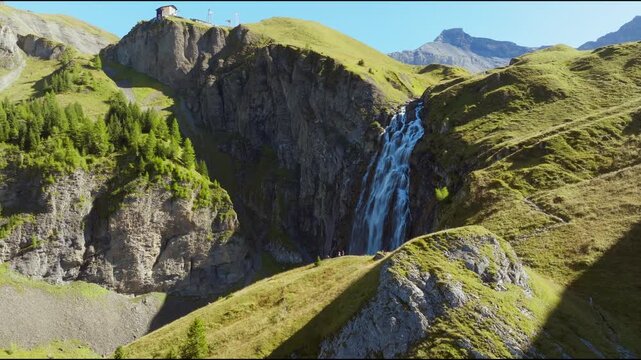 Scenic views of Engstligenalp in the Swiss Alps. Expansive alpine meadows, rugged mountain peaks, dramatic skies and untouched natural landscapes in one of Switzerland's most beautiful alpine regions.