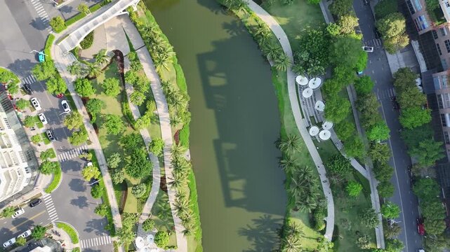 Top-down aerial view of Sala Urban Park Saigon with it's famous bridge in the modern quarter of Ho Chi Minh city, Vietnam.