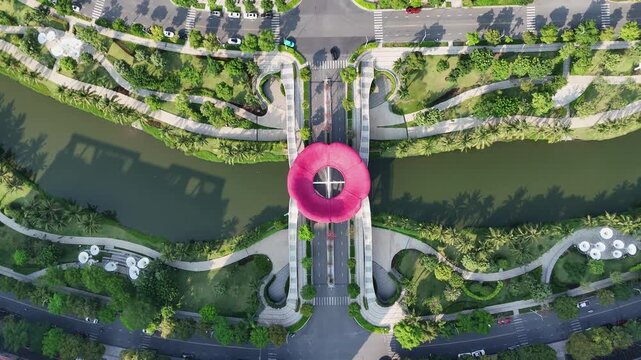 Top-down aerial view of Sala Urban Park Saigon with it's famous bridge in the modern quarter of Ho Chi Minh city, Vietnam.