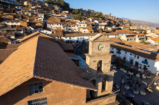 Aerial view of the historic San Blas neighborhood featuring its stone church tower, terracotta rooftops, and narrow streets in Cusco, Cusco, Peru.