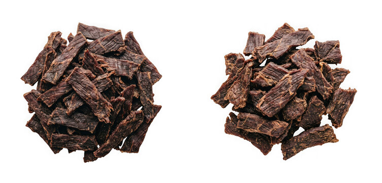 Two piles of beef jerky strips isolated on transparent background