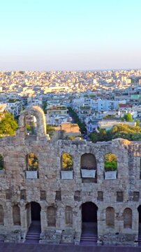 Odeon of Herodes Atticus overlooking Athens at sunset