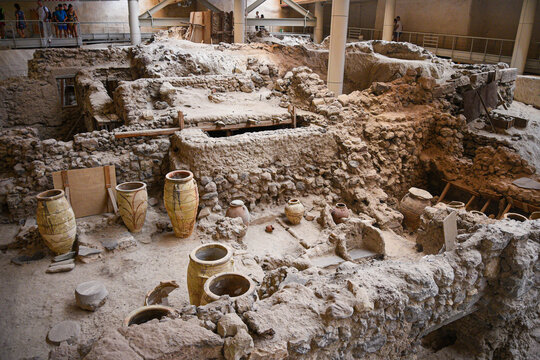 Akrotiri archaeological site displaying Minoan ruins and pottery