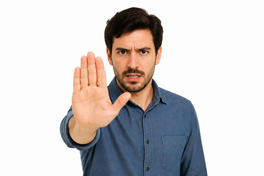 A man with a concerned expression is holding up his hand in a stop gesture against a white background.