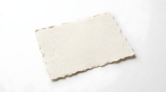Blank handmade note paper sheet with deckle edge on white background