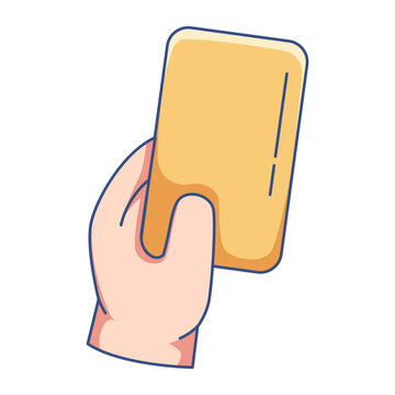 Referee hand holding a yellow card for warning or caution on soccer match