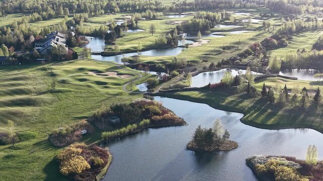 Scenic golf course with sand traps and winding paths
