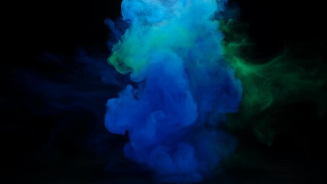 Abstract smoke colours blue green cloud on black background with soft glow, flowing abstract texture and dramatic contrast in dark space with soft swirl