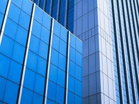 Modern building exterior Blue Glass facade Architecture details Business background