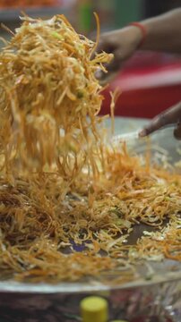 Street Style Chow Mein Cooking, Indian Street Food Noodles, Fresh Veg Chowmein Preparation, Hot Noodles on Large Tawa stock video.