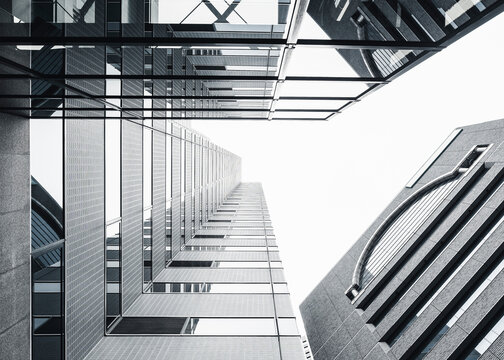 Modern office buildings downtown financial District Business High-rise Architecture skyscrapers Low angle view Black and white