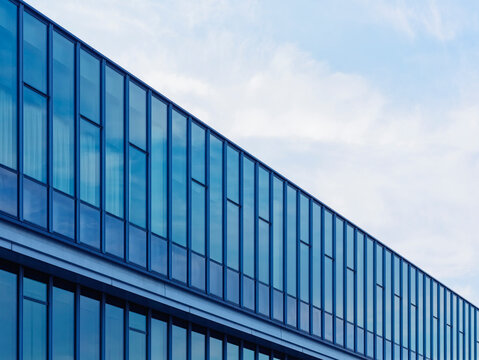 Glass facade Modern building Geometric window pattern Architecture details