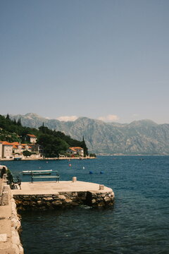 Stone Pier and Bench Overlooking the Bay of Kotor