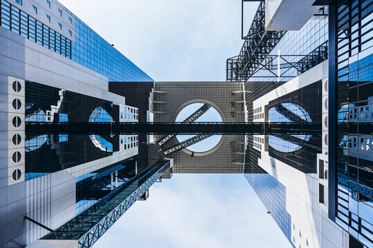 Umeda Sky Building Osaka Modern architecture landmark Tower Low angle view Japan travel : Osaka, Japan- Aug 25, 2025 