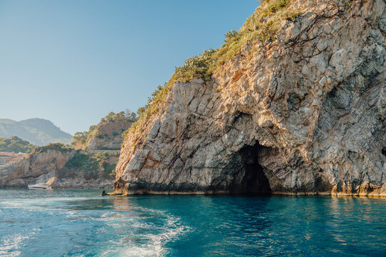 lue Grotto along the dramatic coastline of Taormina, Italy