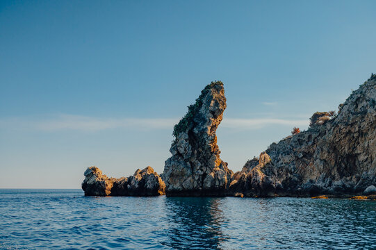 Sea stack off Capo Taormina on the Ionian coast near Taormina, Sicily