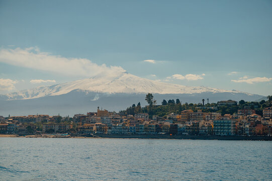 Coastal town of Giardini Naxos with Mount Etna view