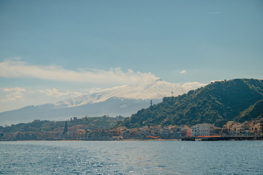 Coastal Sicilian town Giardini Naxos with Mount Etna view
