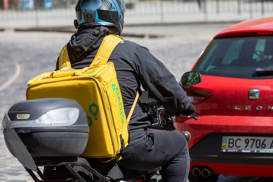 Express Food Delivery Courier Riding In Lviv Ukraine