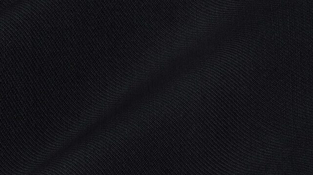 Italian Deep Black Solid Wool Suiting Fabric cascading in sleek pristine waves of smooth matte luxury texture for timeless formal evening suits