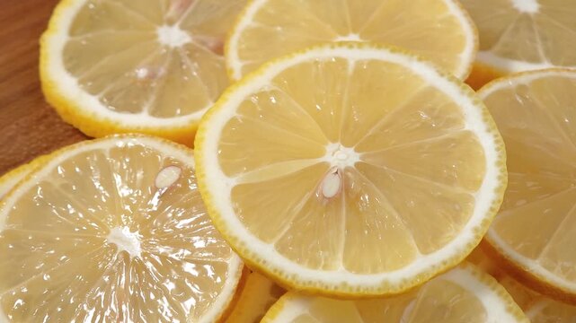 Juicy lemon slices close-up, for background, fruits