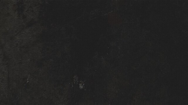 Halftone grunge animated dot texture overlay dark gritty industrial background with grainy noise and vintage film aesthetic for video production.