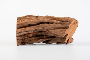 Fototapeta premium Piece of old wood isolated on white background.