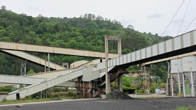 Industrial architecture with conveyors and silos of coal washing plant in Mieres, Asturias, Spain