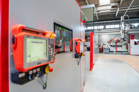 Automated industrial robot inside a modern manufacturing factory
