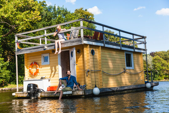 Couple having a trip on a house boat