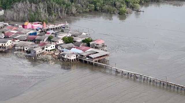 Aerial Drone View of Segenting Village Stilt Houses Evening