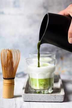 Matcha Latte, pouring matcha tea in a glass