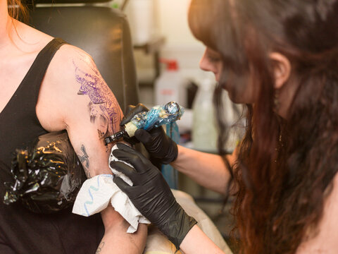 Tattoo artist at work
