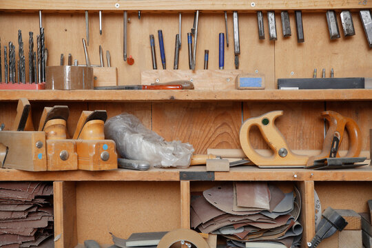Variety of woodworking tools in organized carpentry workshop in Schaeftlarn