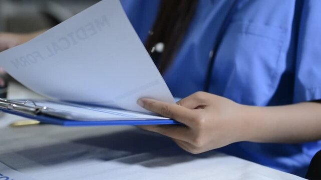 Multiracial doctors team advising about the treatment of patient using x-ray scan during meeting in office clinicMultiracial doctors team 