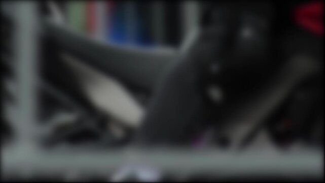 Action shot of professional rider on modern sports motorcycle, demonstrating agility and control. Vehicle structure shows advanced design, hinting at high-speed capabilities and thrill of motorsport.