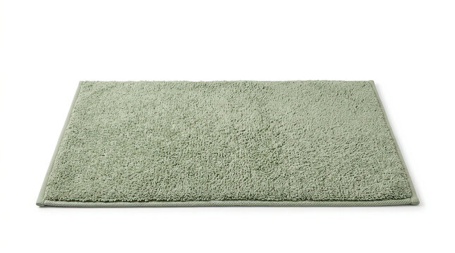 Sage green shaggy bath mat isolated on white. Soft rectangular shower rug
