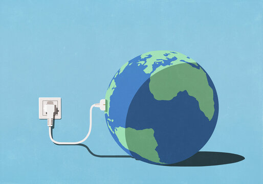 Large globe plugged into electric outlet against blue background