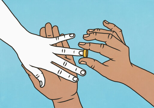 Hands placing engagement ring on ring finger against blue background